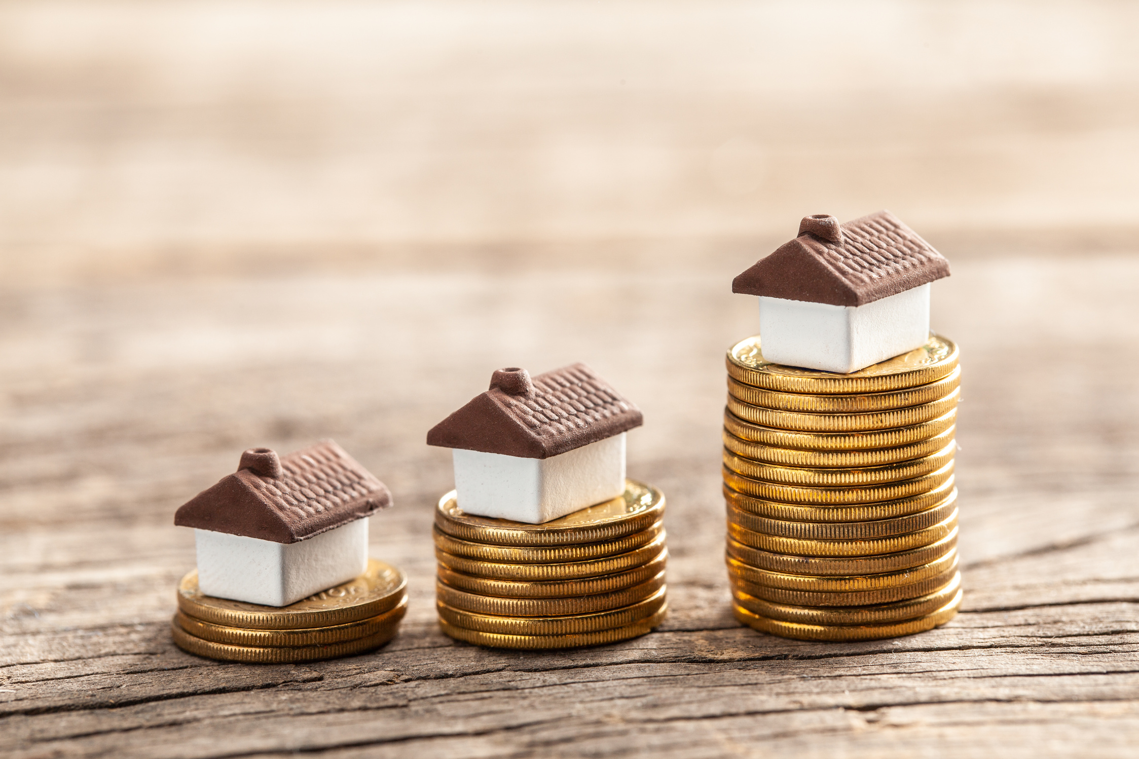 Steps with coins and houses. Real estate market growth